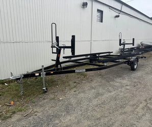 Trailmaster boat trailer with winch and adjustable bunks available at Y Marina